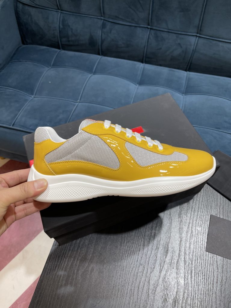 Prada America's Cup Shoe This metallic sneaker is equipped with a lightweight and soft rubber sole, which is comfortable to wear and easy to move. Upper: patent leather, polyamide fiber material metal texture 3cm TPU suction foam sole P450 Size 39-44 (38.45.46.47 customized)