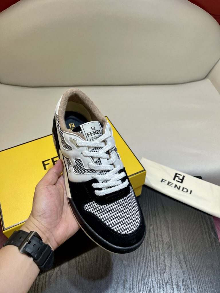 Fendi Match lace-up sneakers. Made of black suede and white leather, with white and black bird check fabric details. Rubber sole with Fendi on the side Size 39-44