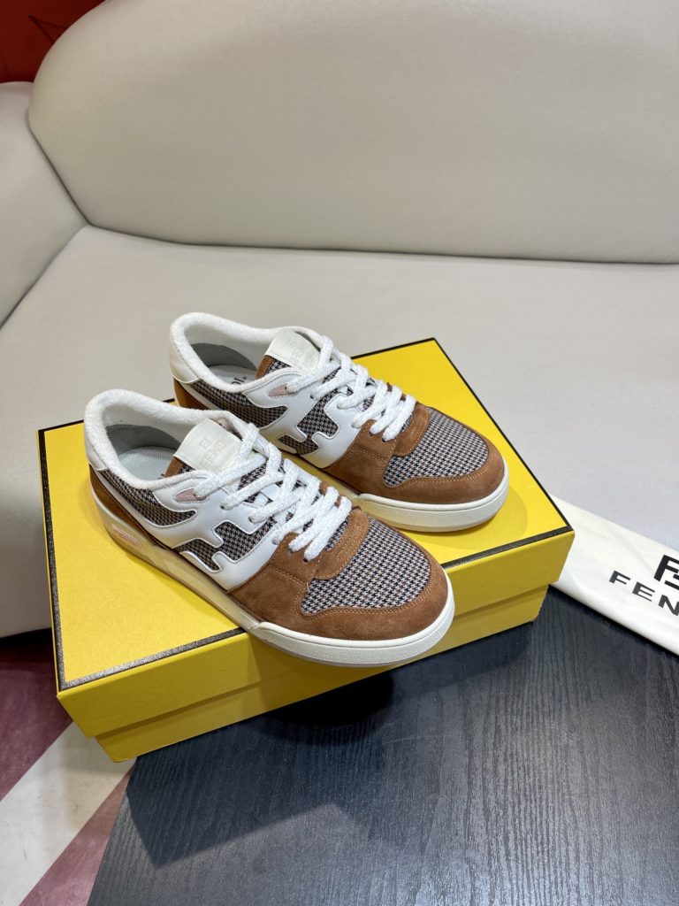 Fendi Match lace-up sneakers. Made of black suede and white leather, with white and black bird check fabric details. Rubber sole with Fendi on the side Size 39-44