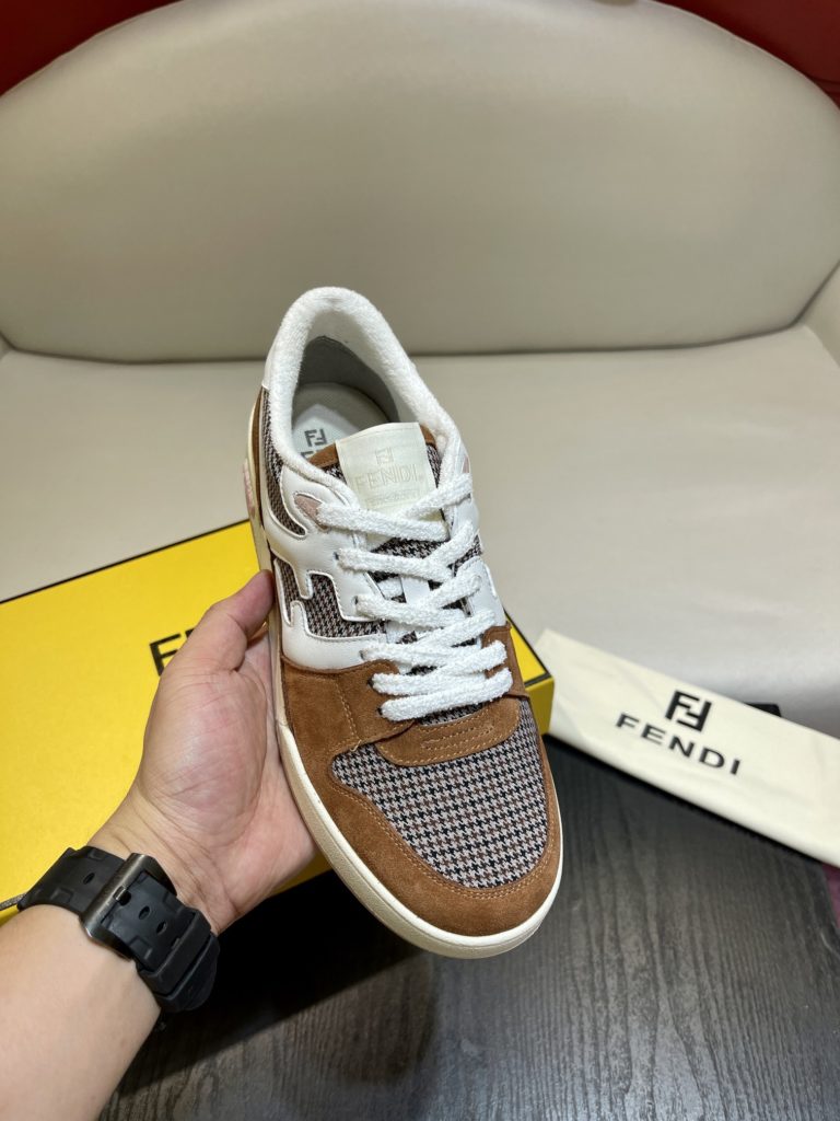 Fendi Match lace-up sneakers. Made of black suede and white leather, with white and black bird check fabric details. Rubber sole with Fendi on the side Size 39-44