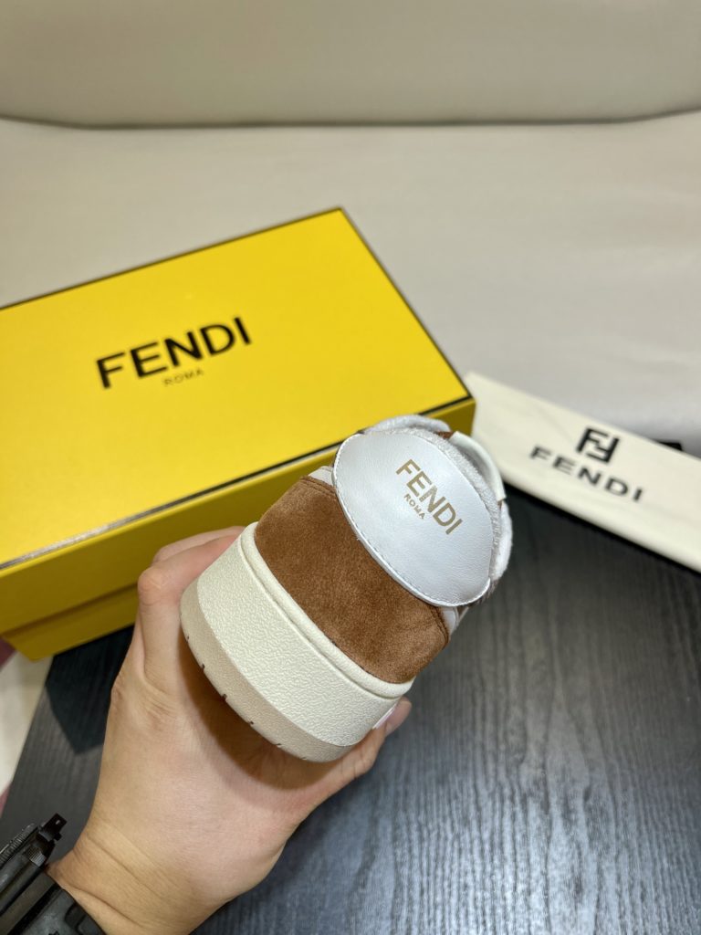 Fendi Match lace-up sneakers. Made of black suede and white leather, with white and black bird check fabric details. Rubber sole with Fendi on the side Size 39-44