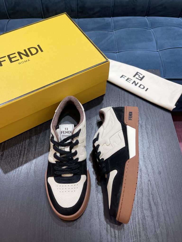 Fendi Match lace-up sneakers. Made of black suede and white leather, with white and black bird check fabric details. Rubber sole with Fendi on the side Size 39-44