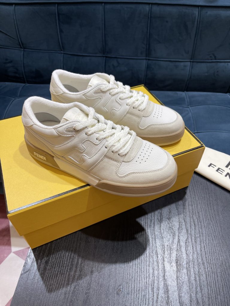 Fendi Match lace-up sneakers. Made of black suede and white leather, with white and black bird check fabric details. Rubber sole with Fendi on the side Size 39-44