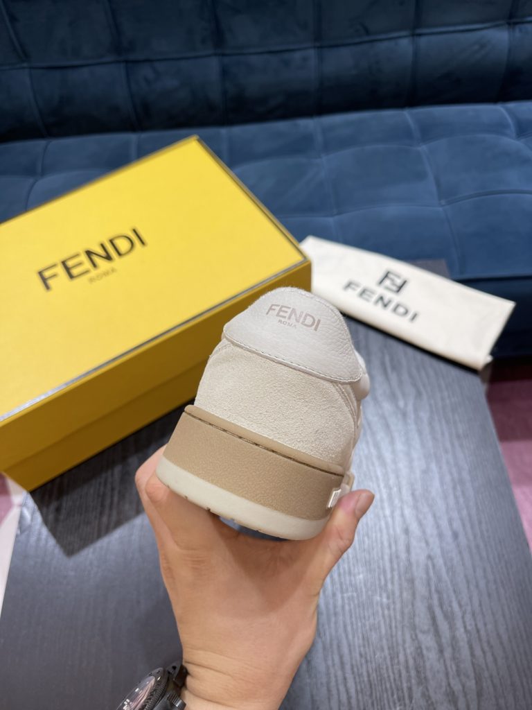 Fendi Match lace-up sneakers. Made of black suede and white leather, with white and black bird check fabric details. Rubber sole with Fendi on the side Size 39-44
