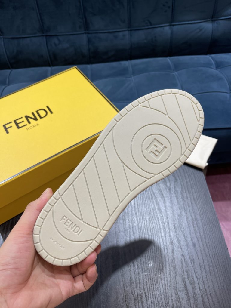 Fendi Match lace-up sneakers. Made of black suede and white leather, with white and black bird check fabric details. Rubber sole with Fendi on the side Size 39-44
