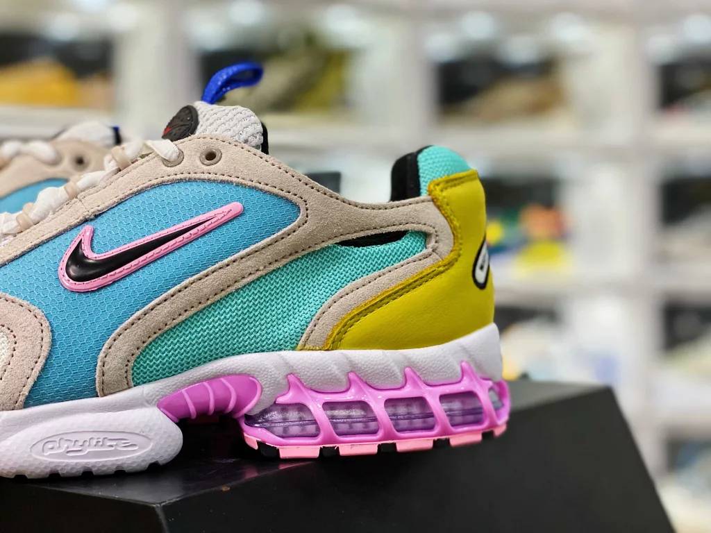 The Nike air Zoom Spiridon Cage Grey Blue Pink CW7482-100 Spiridon Cage 2 features an uncut millennial style, following the classic appearance from its inception in 2003