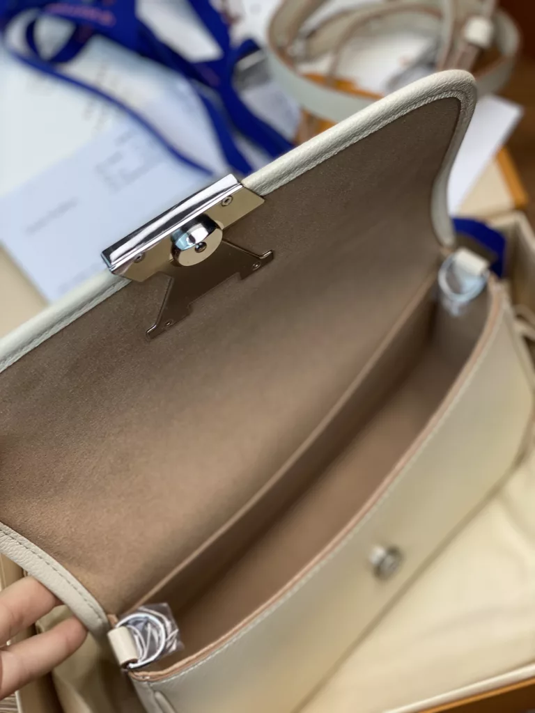 Louis Vuitton water ripple baguette bag