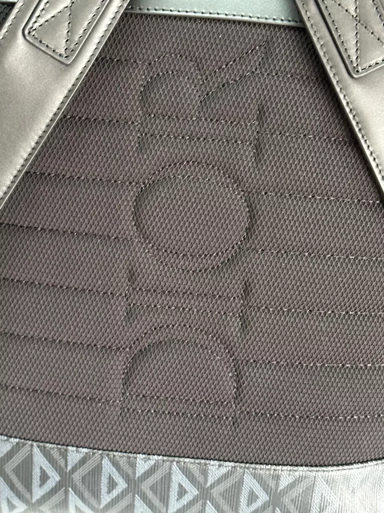 Dior Hit the Road with a backpack
