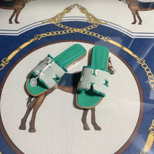 H's 2024SS🤷‍♂️Flat-heeled tasseled H canvas sandals, classic 