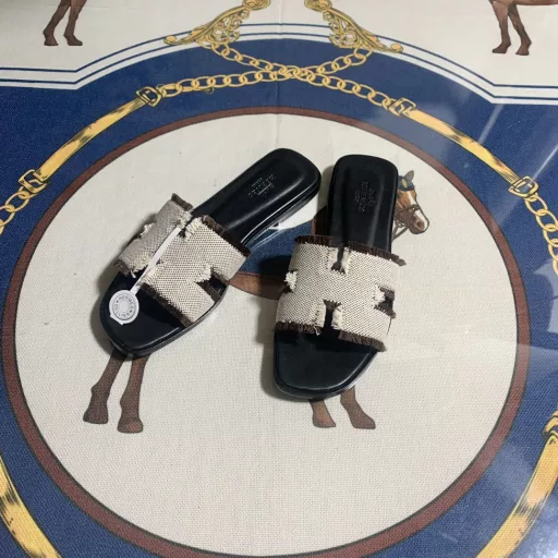 H's 2024SS🤷‍♂️Flat-heeled tasseled H canvas sandals, classic 