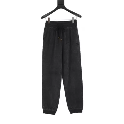 Louis Vuitton & PARK SEO BO Cotton Velvet Set TrousersFrom the LV x Park Seo Bo collection, these sweatpants are a corduroy-effect jacquard with a horizontal weave, a nod to the artist's distinctive style. LV metal decorations are found on the left leg, and the pull on the zippered back pocket recalls the brand's leather goods heritage. Wear with the same top to create a trendy look.