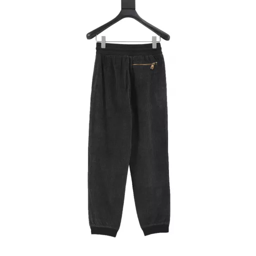 Louis Vuitton & PARK SEO BO Cotton Velvet Set TrousersFrom the LV x Park Seo Bo collection, these sweatpants are a corduroy-effect jacquard with a horizontal weave, a nod to the artist's distinctive style. LV metal decorations are found on the left leg, and the pull on the zippered back pocket recalls the brand's leather goods heritage. Wear with the same top to create a trendy look.