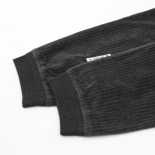 Louis Vuitton & PARK SEO BO Cotton Velvet Set TrousersFrom the LV x Park Seo Bo collection, these sweatpants are a corduroy-effect jacquard with a horizontal weave, a nod to the artist's distinctive style. LV metal decorations are found on the left leg, and the pull on the zippered back pocket recalls the brand's leather goods heritage. Wear with the same top to create a trendy look.