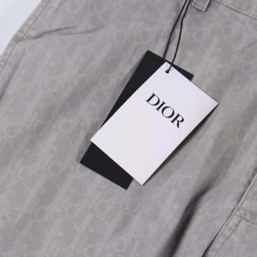 Dior Oblique Printed Jeans SetThis overshirt features an all-over Oblique print, a new take on Dior's classic motif. Crafted from grey cotton denim, it features a patch pocket on the chest and buttons embellished with the Dior logo. A simple yet ingenious design that can be worn with sportswear or a more classic look.