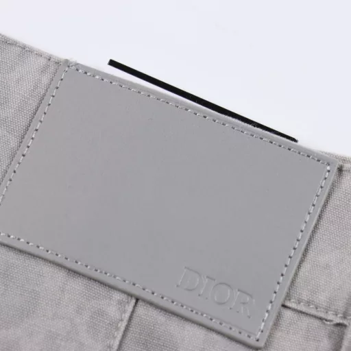 Dior Oblique Printed Jeans SetThis overshirt features an all-over Oblique print, a new take on Dior's classic motif. Crafted from grey cotton denim, it features a patch pocket on the chest and buttons embellished with the Dior logo. A simple yet ingenious design that can be worn with sportswear or a more classic look.