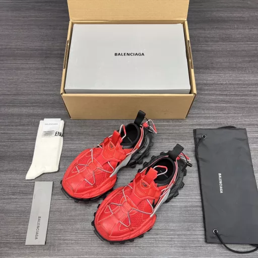 Balenciaga Spring 25 Hiking Sneakers. Balenciaga Spring 25 Hiking features adjustable cords, a wide tread and a slender pointed toe. The cords not only add an extra layer to the upper but also help ensure the security of the sneaker. The worn-in effect applied to the sneaker gives it a heavily used feel.