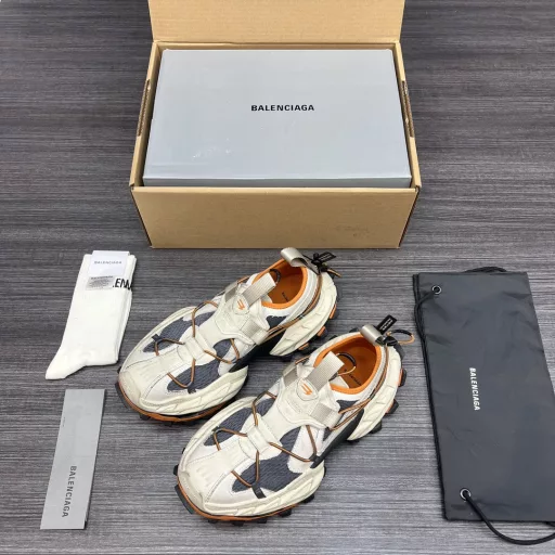 Balenciaga Spring 25 Hiking Sneakers. Balenciaga Spring 25 Hiking features adjustable cords, a wide tread and a slender pointed toe. The cords not only add an extra layer to the upper but also help ensure the security of the sneaker. The worn-in effect applied to the sneaker gives it a heavily used feel.