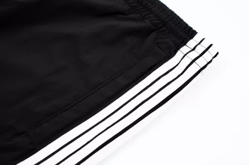 Parisian embroidered trousers with five stripesThe fabric is woven sports fabricWhite strip for fabric cuttingEmbroidery imported Tajima machine precision embroidery
