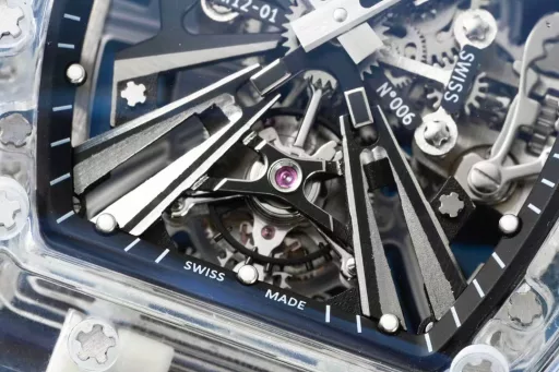 RM Factory reproduces the extraordinary sports quality of Richard MillerAchieving the integration of material innovation and watch architecture, launching a generation of legendary RM12-01 Tourbillon Sapphire Transparent Edition[Case] ​​A fully transparent case is created by combining sapphire crystal to form a technically coherent and visually inseparable whole.The integrated base plate and case are integrated into one, inspired by the chassis of a racing car, which enhances rigidity and impact resistance.[Dial] The lines are inspired by the structural form of architectural design, and the tubular inclined configuration provides optimal rigidity and torsional rigidity, with excellent resistance to thermal changes and corrosive elements. The base plate supports a grade 5 titanium bridge, which is highly original in terms of three-dimensional structure. This outstanding architectural style can withstand accelerations of more than 5,000 Gs.[Movement] The Swiss standard custom-made tourbillon movement proudly displays the ultimate hand-made refinement of the movement through the sapphire crystal. The playful combination of polished pivots, satin polishing, circular surface treatment and high polishing presents a stunning visual effect. RM has broken through the technical barriers and achieved this masterpiece with a transparent movement, bringing a bright and moving appearance to the RM12-01.
