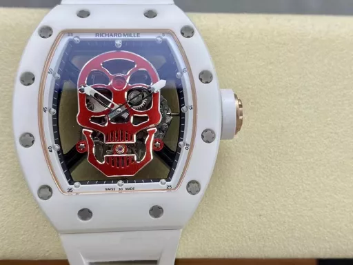 YS Richard Miller RM52-01 white ceramic limited edition real tourbillon reinterprets the essence of the RICHARD MILLE skull, breaking through the bugs of multiple versions, so that the majority of iron fans can have a super high replica with correct size, real movement and in-depth details. Reasons to buy:Size is similar: official length, width and thickness: 504316mm, YS factory length, width and thickness: 49.844.316.4mm;Real bearing: The ruby ​​in the skull's mouth is the real bearing of the tourbillon, not decoration. The gem corresponds to the tourbillon center axis wrapped by the upper and lower jaws, as if swallowing an energy ball, so that the sci-fi artistic conception that the original wants to express can be reflected;Details are in place: The inner wall on the left side of the case inner cover is printed with the RM052 steel stamp like the original, and the size and depth of the right eye gear are close to the original , the center gemstone on the forehead is ruddy and translucent, frosted clasp, imported Thai raw rubber strap;Movement alignment: Thanks to the consistent size of the tourbillon and the original one, from the back of the skull, you can clearly see the operation of the tourbillon with the gemstone coaxial. From the front, the black balance wheel is just blocked by the skull's jaw, leaving only the escape wheel to move under the skull;Inside and outside: The movement is a real tourbillon movement customized by Shanghai Movement Factory. Each watch is QE-edged by a high-intensity simulator, and it is also waterproof.YS Factory——Use the core more carefully!
