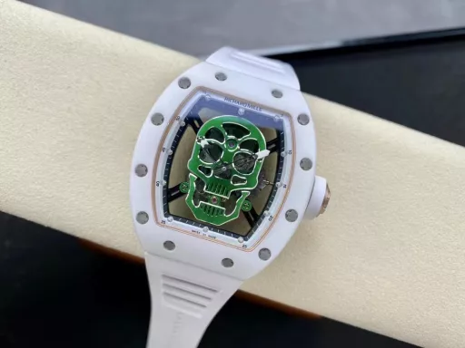 YS Richard Miller RM52-01 white ceramic limited edition real tourbillon reinterprets the essence of the RICHARD MILLE skull, breaking through the bugs of multiple versions, so that the majority of iron fans can have a super high replica with correct size, real movement and in-depth details. Reasons to buy:Size is similar: official length, width and thickness: 504316mm, YS factory length, width and thickness: 49.844.316.4mm;Real bearing: The ruby ​​in the skull's mouth is the real bearing of the tourbillon, not decoration. The gem corresponds to the tourbillon center axis wrapped by the upper and lower jaws, as if swallowing an energy ball, so that the sci-fi artistic conception that the original wants to express can be reflected;Details are in place: The inner wall on the left side of the case inner cover is printed with the RM052 steel stamp like the original, and the size and depth of the right eye gear are close to the original , the center gemstone on the forehead is ruddy and translucent, frosted clasp, imported Thai raw rubber strap;Movement alignment: Thanks to the consistent size of the tourbillon and the original one, from the back of the skull, you can clearly see the operation of the tourbillon with the gemstone coaxial. From the front, the black balance wheel is just blocked by the skull's jaw, leaving only the escape wheel to move under the skull;Inside and outside: The movement is a real tourbillon movement customized by Shanghai Movement Factory. Each watch is QE-edged by a high-intensity simulator, and it is also waterproof.YS Factory——Use the core more carefully!