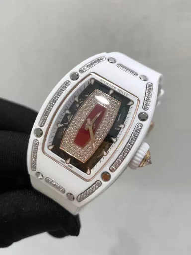 BBA Richard Miller RM0071⃣️Case: Uses the same ZTA white/black ceramic case as the original.2⃣️Movement: Exclusively customized movement to restore the original3⃣️Watch diameter: 1:1 restore the original 45.66x31.40mm, thickness is 11.85MM4⃣️Watch mirror material: Sapphire crystal mirror double anti-glare effect.5⃣️Watch strap material: Imported fluororubber watch strap, corrosion-resistant, comfortable and durable6⃣️Watch buckle: The latest titanium metal material7⃣️Diamond setting process: Breaking the traditional machine setting process, pure hand-made setting 8⃣️Electroplating process: PVD electroplating platinum