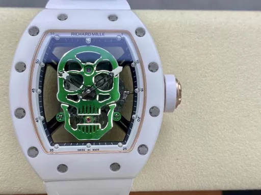 YS Richard Miller RM52-01 white ceramic limited edition real tourbillon reinterprets the essence of the RICHARD MILLE skull, breaking through the bugs of multiple versions, so that the majority of iron fans can have a super high replica with correct size, real movement and in-depth details. Reasons to buy:Size is similar: official length, width and thickness: 504316mm, YS factory length, width and thickness: 49.844.316.4mm;Real bearing: The ruby ​​in the skull's mouth is the real bearing of the tourbillon, not decoration. The gem corresponds to the tourbillon center axis wrapped by the upper and lower jaws, as if swallowing an energy ball, so that the sci-fi artistic conception that the original wants to express can be reflected;Details are in place: The inner wall on the left side of the case inner cover is printed with the RM052 steel stamp like the original, and the size and depth of the right eye gear are close to the original , the center gemstone on the forehead is ruddy and translucent, frosted clasp, imported Thai raw rubber strap;Movement alignment: Thanks to the consistent size of the tourbillon and the original one, from the back of the skull, you can clearly see the operation of the tourbillon with the gemstone coaxial. From the front, the black balance wheel is just blocked by the skull's jaw, leaving only the escape wheel to move under the skull;Inside and outside: The movement is a real tourbillon movement customized by Shanghai Movement Factory. Each watch is QE-edged by a high-intensity simulator, and it is also waterproof.YS Factory——Use the core more carefully!