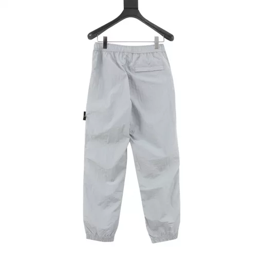 Stone Island SS23 Nylon Meta series solid color metal nylon elastic pants loose long casual pants metal nylon fabric gloss perfect restore extremely comfortable touch Original logo Metal nylon series yyds functional wind full set of original three standard accessories complete hardware logo custom laser logo