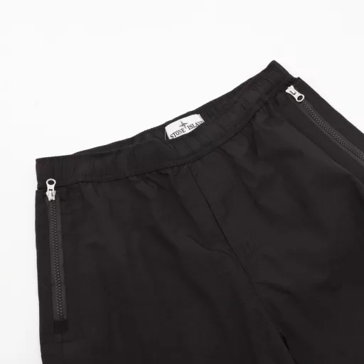 Stone Island SS23 Nylon Meta series solid color metal nylon elastic pants loose long casual pants metal nylon fabric gloss perfect restore extremely comfortable touch Original logo Metal nylon series yyds functional wind full set of original three standard accessories complete hardware logo custom laser logo