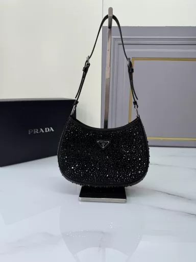 Gypsophila Underarm Bag🎉New Color😘😘This Cleo satin handbag is covered with sparkling imported crystals of various sizes. It has two adjustable interchangeable cowhide shoulder straps, which are convenient for shoulder/crossbody design, exuding exquisite charm. The retro curved silhouette is unique. This Gypsophila Underarm Bag looks more gentle, elegant and modern. It's so beautiful😘You'll always be the focus wherever you go👏Hurry up and get it