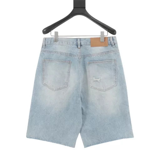 MAISON MARGIELA MM6 Masking tape hole five-point denim shortsImported denim non-stretch fabric, using original color yeast washing process, softened by washing, very comfortable and drapey. Masking tape sticker hole, all handmade, time-consuming and labor-intensive. Custom leather brand, exquisite sewing, heavy washing and comfortable and breathable fabric
