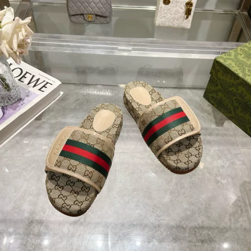 Gucci women's signature shoe features an eye-catching theme. The all-over jacquard design features a geometric GG canvas with classic green, red and green Web.Beige GG jacquard with classic green, red and green Web