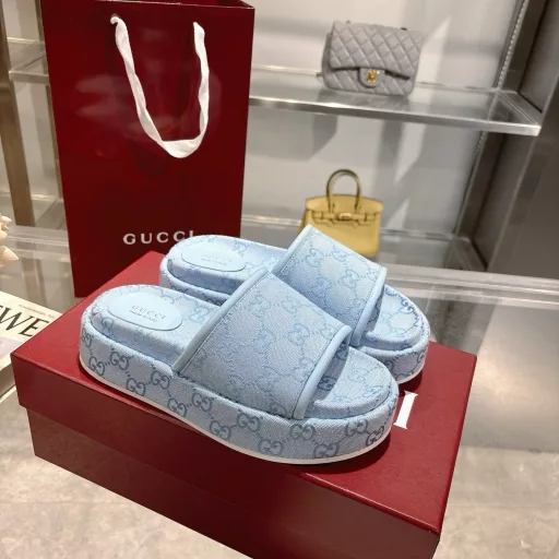 2025 Women's New GG Platform Slide SandalsThe iconic Gucci logo and sophisticated patterns are reinterpreted in a contemporary way for the latest Gucci collection. Made from GG canvas, these wedge-shaped slide sandals feature an iconic silhouette.Original GG canvas in beige and light apricot
