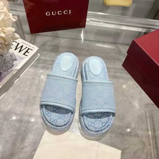 2025 Women's New GG Platform Slide SandalsThe iconic Gucci logo and sophisticated patterns are reinterpreted in a contemporary way for the latest Gucci collection. Made from GG canvas, these wedge-shaped slide sandals feature an iconic silhouette.Original GG canvas in beige and light apricot