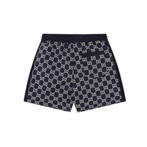 Gucci GG full print monogram embroidered shortsInterlocking double G print, drawstring elastic waistband, straight shorts style, full set of accessories! Polyester fiber is a blended fabric, contrasting fabric is fixed color and environmentally friendly. It also has good light resistance, and its sun resistance is better than natural fiber fabrics. It uses three-level bird's eye cloth fabric, which is a functional weft knitted fabric with moisture absorption and perspiration function. The principle of perspiration is through the small holes on its surface. Due to the existence of these small holes, it can achieve the effect of moisture absorption and perspiration. The double G pattern is made of thick glue material, and the glue is specially adjusted with environmentally friendly glue. The front end of the elastic waist rope has an engraved hardware bell, the front trouser line is stitched, and the trouser legs are closed with visible lines, which are strong and durable.