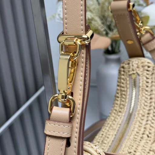 New Woven Moon Bag: Featuring a curvaceous half-moon silhouette, the raffia fabric gives it structure and uniqueness. Reinterpreted with a more refined design, full of summer mood, cleverly adding details such as handles and detachable shoulder straps, it can be worn in a variety of styles