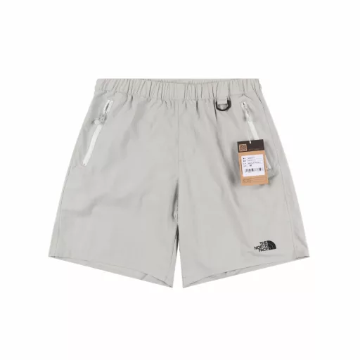 The North Face casual elastic shortsImported fabrics, anti-static coating treatment, all imported polyester, all whole pieces, very natural and soft, machine washable, no shrinkage, color half dry when taken out, fabric quick-drying effect is particularly good, seemingly simple craftsmanship, all stitches and threads are used, simple and elegant style, exquisite embroidery highlights temperament, more comfortable sports and leisure, zipper hand pockets, buckle rings at waist, safer storage, versatile style, classic and very elegant evergreen style, unisex series, fashionable large pocket design, both beautiful and practical, elastic waistband, built-in adjustable drawstring, zipper design on the back pocket
