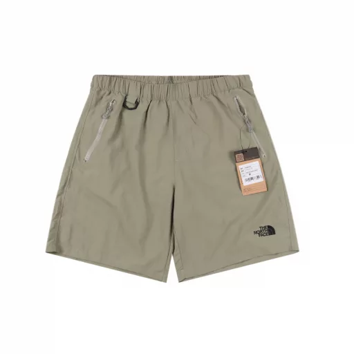The North Face casual elastic shortsImported fabrics, anti-static coating treatment, all imported polyester, all whole pieces, very natural and soft, machine washable, no shrinkage, color half dry when taken out, fabric quick-drying effect is particularly good, seemingly simple craftsmanship, all stitches and threads are used, simple and elegant style, exquisite embroidery highlights temperament, more comfortable sports and leisure, zipper hand pockets, buckle rings at waist, safer storage, versatile style, classic and very elegant evergreen style, unisex series, fashionable large pocket design, both beautiful and practical, elastic waistband, built-in adjustable drawstring, zipper design on the back pocket