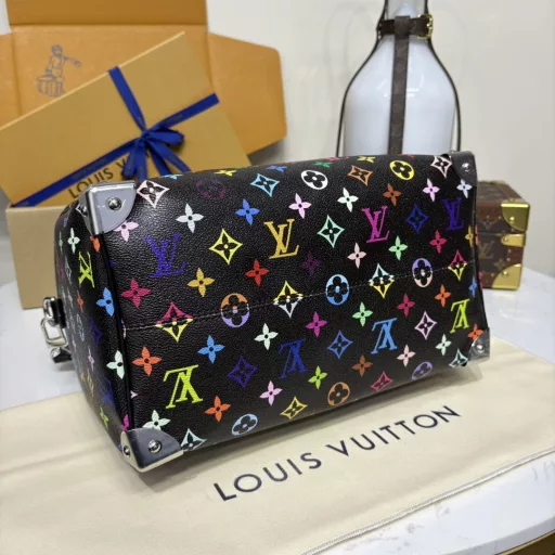 The Speedy Soft 30 is crafted from soft coated canvas with a rainbow-hued Monogram pattern, a nod to the x Takashi Murakami re-edition. Calf leather makes the Toron handles and removable shoulder strap, while metal corners recall classic luggage elements, while a bow-shaped key case and padlock add a brand touch.