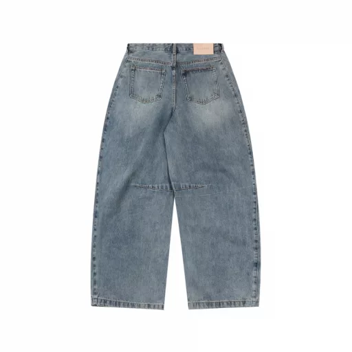 Loewe Anagram tapered denim pantsCustomized elegant rough twill denim material, laser laser technology, using high-energy laser beam to accurately process the material surface, by controlling the intensity, frequency and scanning speed of the laser beam, high-precision Loewe Anagram engraving can be achieved, using sand frying hand rubbing technology, through processing on the sand frying machine, the surface of the jeans will fade and wear naturally, and then the surface of the jeans will be physically damaged by hand using special tools, maintaining the original texture and details while increasing its uniqueness, heavy washing and whitening process, through physical and chemical means, the denim fabric is deeply processed multiple times, so that the surface of the pants presents a gray effect, and then the denim fabric is polished by machine to make the surface of the pants have a worn effect, customized accessories, fit version