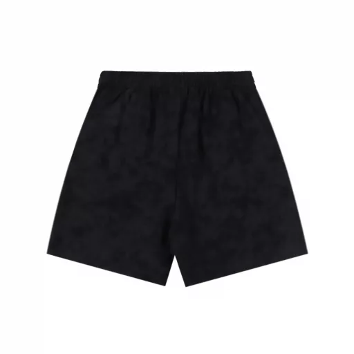 Balenciaga Red Label Embroidered Black Sports ShortsThe fabric uses special perspiration technology to allow sweat to quickly contact the air, thereby helping the body stay dry and improving the comfort of wearing. The texture is soft and comfortable to the touch. It can fit the body when worn and reduce friction. It is made of high-elastic material, so it has good elasticity and can adapt to various movements of the body, and it is not easy to feel restrained when worn.The matte needle embroidery process is an embroidery technique characterized by the use of specific needles and line widths during the embroidery process to make the embroidered letters present a matte effect. The process focuses more on controlling the reflection and scattering of light to achieve a matte effect, and the embroidery effect has smooth and delicate lines.The ready-made garment is dyed by stone grinding and tumbling in the dye. The fabric is slightly whitish after frying the sand, changing the original fabric color to present a nostalgic color with different shades.