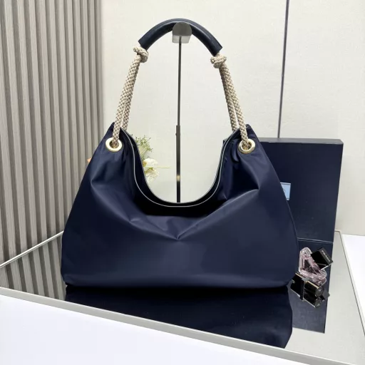 New Tote Bag 🎉1BC244 Large Shopping Bag🎉🎉This recycled nylon bag is inspired by classic marine elements, with a novel and exquisite combination to highlight a lively and individual style. The sliding braided handle outlines the oversized silhouette of this versatile accessory, and the enameled triangular metal logo highlights the brand identity. It has a large capacity and the upper body effect is very charming😘😘Lightweight and practical, it is another timeless hit