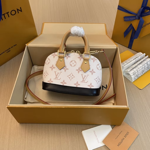 Nano Alma Shell BagThe classic Alma bag shape is condensed to create a leather trim on the Monogram Dune canvas from the Cruise 2024 runway. The delicate handles and removable and adjustable shoulder strap allow for multiple carrying options.