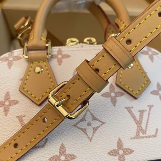 Nano Alma Shell BagThe classic Alma bag shape is condensed to create a leather trim on the Monogram Dune canvas from the Cruise 2024 runway. The delicate handles and removable and adjustable shoulder strap allow for multiple carrying options.